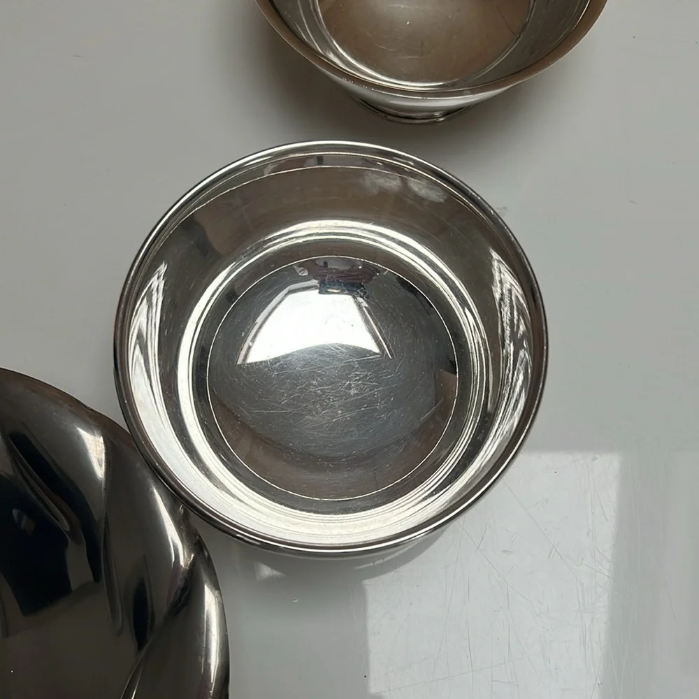 3 silver plated dishes.